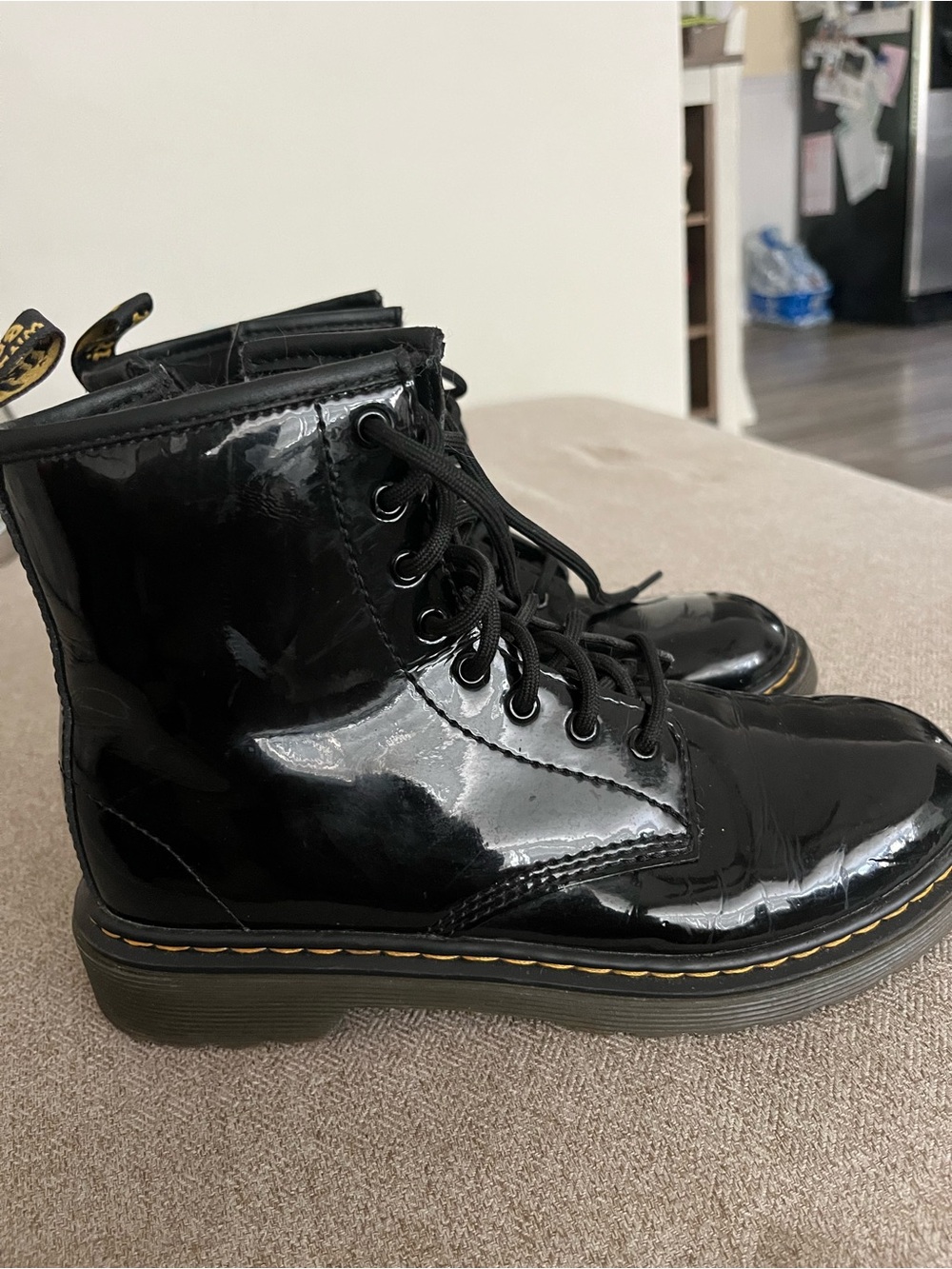Dr. Martens Black Patent Lace-Up Kids Boots with Yellow Stitching